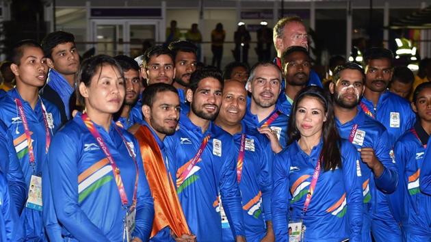 Indian contingent with officials during the country's flag-hoisting ceremony at the Commonwealth Games 2018 in Gold Coast, Australia, on Monday.(PTI)