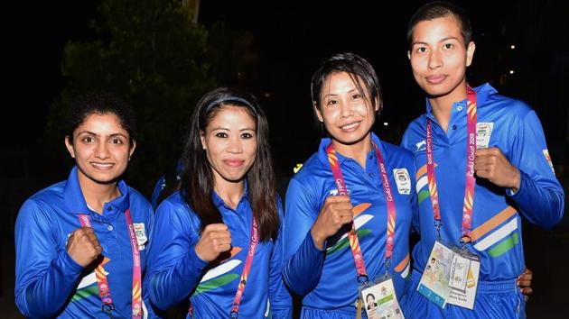 Indian boxing contingent (L-R) Pinki Rani Jangra, Mary Kom, Sarita Devi Laishram and Lovlina Borgohain during the country's flag-hoisting ceremony at the Commonwealth Games 2018 in Gold Coast.(PTI)