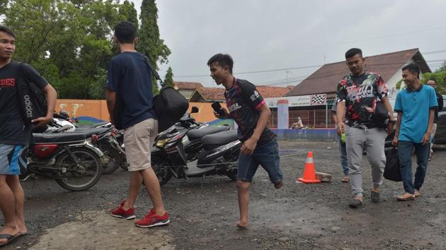 His perseverance paid off when friends asked him to join the local football team as he completed an electronic engineering degree. “At my first tournament, the other team’s manager doubted me and asked if I really could play,” he said. Despite the challenges posed by his birth defect, Sulaeman never considered wearing prosthetic legs. (Adek Berry / AFP)