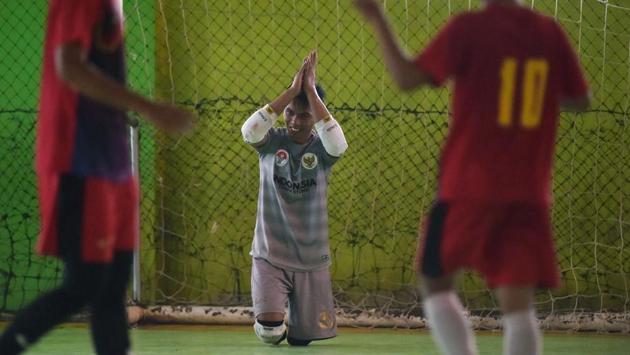 Sulaeman -- who runs an electronics repair shop -- is determined to spread his love for the sport by establishing a futsal lover’s community in his hometown Majalengka and coach football at local schools. “Football for me is just like my wife. My girlfriend is even jealous of it because I love it too much,” Sulaeman laughed. (Adek Berry / AFP)