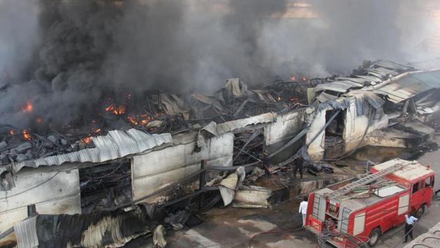 At least 12 godowns where oil and tyres were stored in Shree Ganesh Compound at Gundawali village in Bhiwandi were charred in the incident.(PRAFUL GANGURDE) At least 12 godowns where oil and tyres were stored in Shree Ganesh Compound at Gundawali village in Bhiwandi were charred in the incident.(PRAFUL GANGURDE)