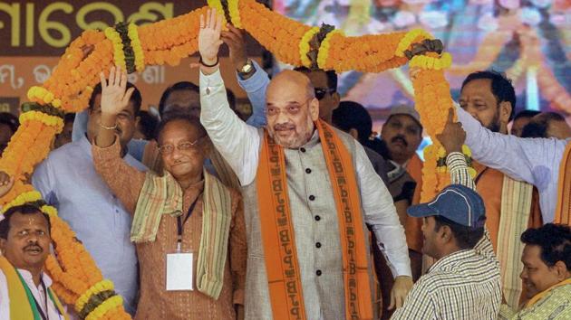 BJP president Amit Shah being garlanded during a public meeting in Bhawanipatna on Wednesday. (PTI Photo) BJP president Amit Shah being garlanded during a public meeting in Bhawanipatna on Wednesday. (PTI Photo)
