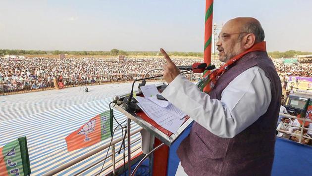 BJP president Amit Shah, who launched a two-day tour of Odisha on Wednesday, said at a public meeting in Kalahandi district that nobody has the audacity to change the provisions for reservation in the Constitution written by Babasaheb Ambedkar.(PTI File)