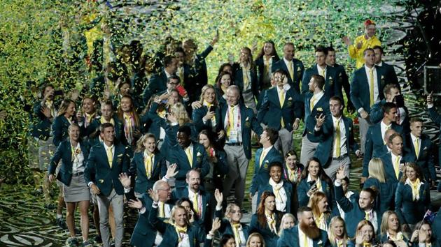 Australian athletes march into Carrara Stadium for the opening ceremon. (AP)