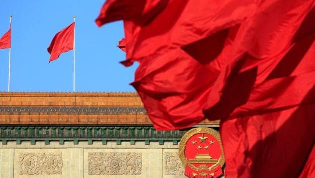 Red flags flutter outside the Great Hall of the People before the second plenary session of the Chinese People's Political Consultative Conference (CPPCC) in Beijing on March 8, 2018.(REUTERS FILE)