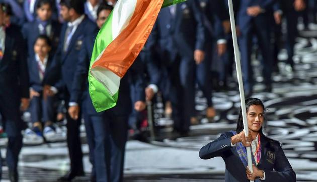 Flagbearer PV Sindhu leads the Indian contingent at Carrara Stadium during the opening ceremony of 2018 Commonwealth Games, Gold Coast. (PTI)