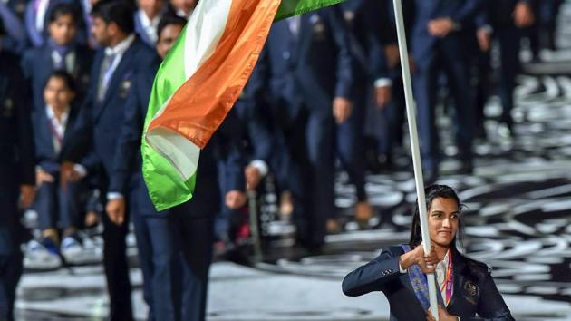 Flagbearer PV Sindhu leads the Indian contingent at Carrara Stadium during the opening ceremony of 2018 Commonwealth Games in Gold Coast, Australia, on Wednesday.(PTI) Flagbearer PV Sindhu leads the Indian contingent at Carrara Stadium during the opening ceremony of 2018 Commonwealth Games in Gold Coast, Australia, on Wednesday.(PTI)