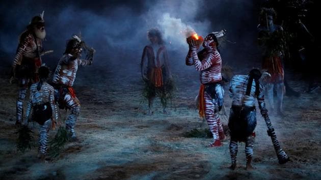 Artists depicting aboriginals perform during the opening ceremony. (REUTERS)