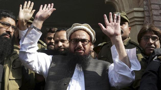 File photo of Lashkar-e-Taiba head Hafiz Saeed arriving at a Lahore court in November 2017.(AP) File photo of Lashkar-e-Taiba head Hafiz Saeed arriving at a Lahore court in November 2017.(AP)