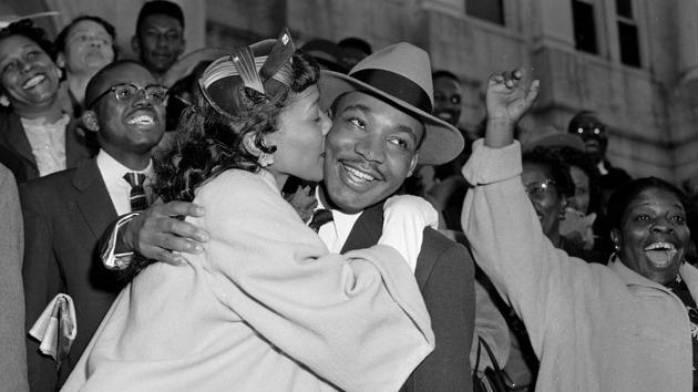 Martin Luther King Jr. is welcomed with a kiss by his wife, Coretta, after leaving court in Montgomery, Alabama on March 22, 1956. King was found guilty in the Montgomery Bus Boycott, a seminal event in the Civil Rights Movement, after Rosa Parks, an African American woman was arrested for refusing to surrender her seat to a white person in 1955. (Gene Herrick / AP File) Martin Luther King Jr. is welcomed with a kiss by his wife, Coretta, after leaving court in Montgomery, Alabama on March 22, 1956. King was found guilty in the Montgomery Bus Boycott, a seminal event in the Civil Rights Movement, after Rosa Parks, an African American woman was arrested for refusing to surrender her seat to a white person in 1955. (Gene Herrick / AP File)