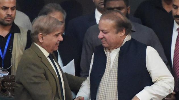 Pakistani chief minister of Punjab province Shahbaz Sharif (L), shakes hands with his brother and ousted prime minister Nawaz Sharif (R), after being elected President of ruling Pakistan Muslim League-Nawaz (PML-N) in Islamabad on March 13. (AFP Photo) Pakistani chief minister of Punjab province Shahbaz Sharif (L), shakes hands with his brother and ousted prime minister Nawaz Sharif (R), after being elected President of ruling Pakistan Muslim League-Nawaz (PML-N) in Islamabad on March 13. (AFP Photo)