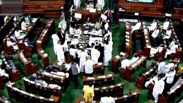 Opposition members protest during the ongoing budget session of Parliament in Lok Sabha in New Delhi on Wednesday.(PTI Photo) Opposition members protest during the ongoing budget session of Parliament in Lok Sabha in New Delhi on Wednesday.(PTI Photo)