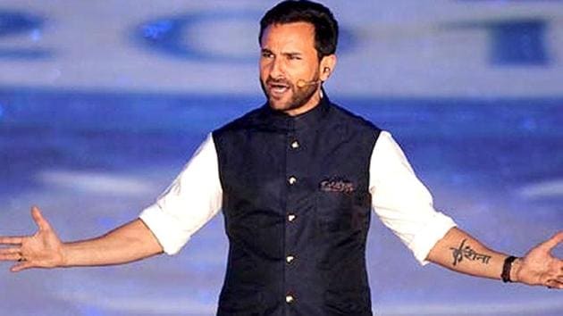 Saif looking dapper in a white pajama-kurta and bandgala at the opening ceremony of IPL season 8 in Kolkata. Saif looking dapper in a white pajama-kurta and bandgala at the opening ceremony of IPL season 8 in Kolkata.