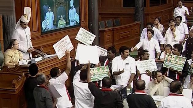 Opposition members protest in front of Lok Sabha Speaker Sumitra Mahajan during the second phase of the budget session of Parliament, in New Delhi on Wednesday.(PTI) Opposition members protest in front of Lok Sabha Speaker Sumitra Mahajan during the second phase of the budget session of Parliament, in New Delhi on Wednesday.(PTI)