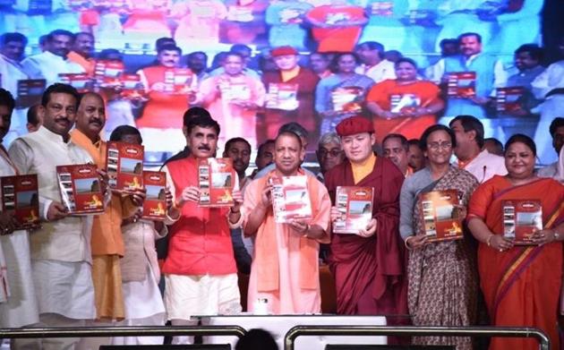 CM Yogi Adityanath releasing a souvenir at Kaushambi Mahotsav. (HT Photo) CM Yogi Adityanath releasing a souvenir at Kaushambi Mahotsav. (HT Photo)