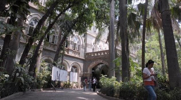 The BMC aims to make heritage structures such as St Xavier’s College on Mahapalika Marg more visible from the streets and give tourists a comfortable place to stroll.(HT File Photo)