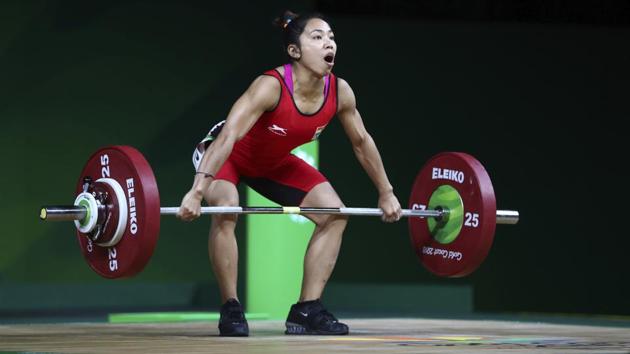 Mirabai Chanu lifts to set a new Commonwealth Games record in snatch in women's 48kg Weightlifting at the Commonwealth Games in Gold Coast, Australia on April 5, 2018. (AP) Mirabai Chanu lifts to set a new Commonwealth Games record in snatch in women's 48kg Weightlifting at the Commonwealth Games in Gold Coast, Australia on April 5, 2018. (AP)