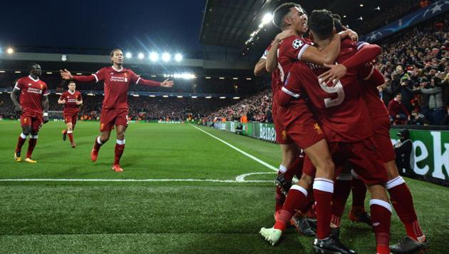 Liverpool celebrate their second goal during the UEFA Champions League first leg quarter-final vs Manchester City at Anfield stadium in Liverpool on April 4, 2018.(AFP) Liverpool celebrate their second goal during the UEFA Champions League first leg quarter-final vs Manchester City at Anfield stadium in Liverpool on April 4, 2018.(AFP)