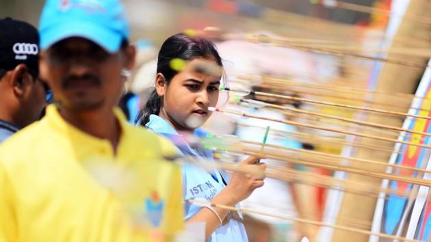 A participant counts her points from the board which she used. A large number of women are participating in the event. (Shankar Narayan/HT PHOTO) 
