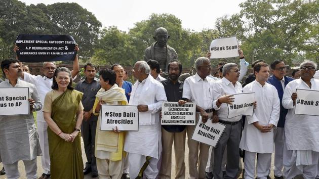 Opposition members protest in Parliament during the budget session in New Delhi on Thursday.(PTI Photo) Opposition members protest in Parliament during the budget session in New Delhi on Thursday.(PTI Photo)