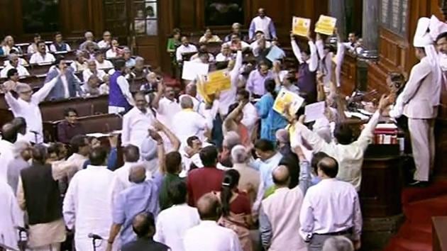 Opposition members protest during the on-going budget session of Rajya Sabha, at Parliament House in New Delhi on Wednesday.(PTI) Opposition members protest during the on-going budget session of Rajya Sabha, at Parliament House in New Delhi on Wednesday.(PTI)