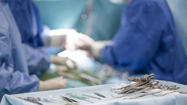 sterile surgical instruments on during the operation table amid the surgeons(Getty Images/iStockphoto)