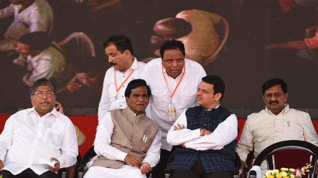 Chief minister Devedra Fadnavis (third from left, seated) shares the stage with other BJP leaders. (Satish Bate/ht photo)