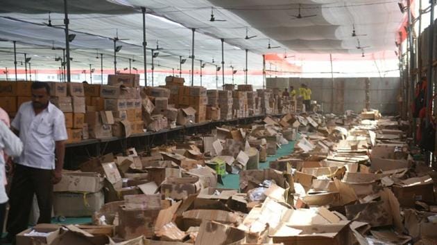 Heaps of cardboard boxes lie near the free food stall at the venue. (satyabrata tripathy/htphoto)