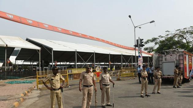 Cops assemble outside MMRDA grounds. While the party holds foundation day celebrations every year, this show, a year ahead of the polls, was aimed at showcasing its growth in the past four years and energising its cadre. (satyabrata tripathy/HT photo)