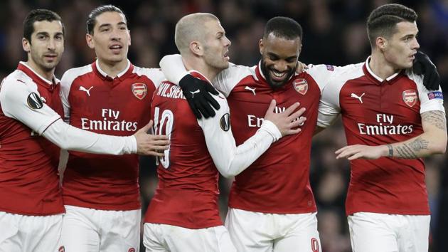Arsenal FC's Alexandre Lacazette, 2nd right, celebrates with teammates after scoring his sides fourth goal during the Europa League quarterfinal first leg football match against CSKA Moscow at the Emirates stadium in London on Thursday.(AP)