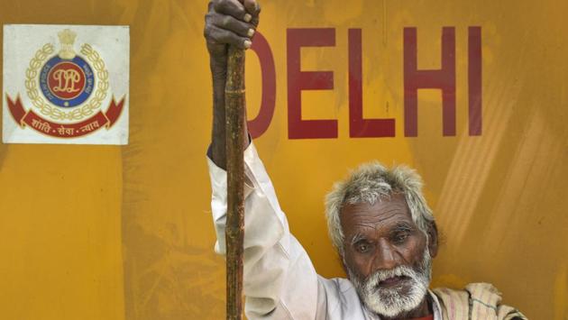 A Dalit protester rests during a protest against alleged dilutions to the SC/ST act at Parliament street in New Delhi on April 01, 2018. (Burhaan Kinu / HT Photo) A Dalit protester rests during a protest against alleged dilutions to the SC/ST act at Parliament street in New Delhi on April 01, 2018. (Burhaan Kinu / HT Photo)