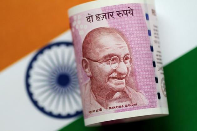 So far this year, the rupee fell 1.76%, while foreign investors have bought $2.10 billion and $400 million in equity and debt markets respectively.(Reuters File Photo)