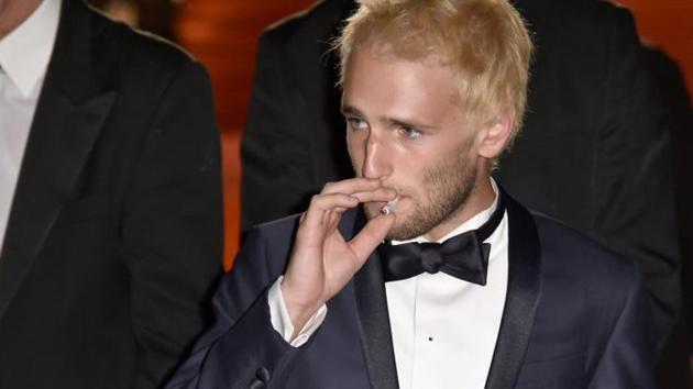 US actor Hopper Jack Penn, who has been arrested for possession of drugs , is seen smoking a cigarette after the screening of The Last Face at the 69th Cannes Film Festival in Cannes, southern France.(AFP/Getty Images)