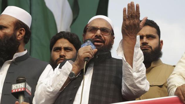 Hafiz Saeed, head of the Jamaat-ud-Dawa, addresses Kashmir Solidarity Conference in Lahore on April 6, 2018.(AP)