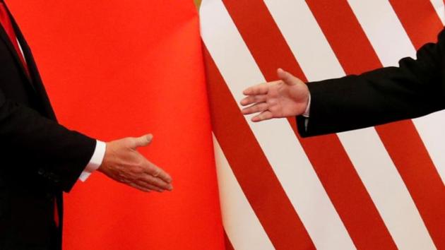 US President Donald Trump and China's President Xi Jinping shake hands after making joint statements at the Great Hall of the People in Beijing. (Reuters file photo) US President Donald Trump and China's President Xi Jinping shake hands after making joint statements at the Great Hall of the People in Beijing. (Reuters file photo)