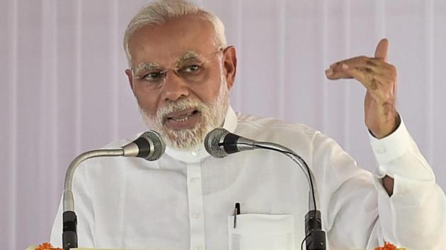 Prime Minister Narendra Modi addresses a gathering in New Delhi on Wednesday.(PTI)