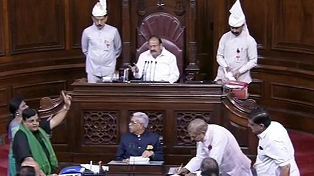 Opposition members protest during the on-going Budget Session of Rajya Sabha, at Parliament House in New Delhi.(PTI File Photo)