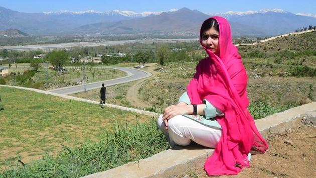 Pakistani activist and Nobel Peace Prize laureate Malala Yousafzai poses for a photograph at all-boys Swat Cadet College Guli Bagh, some 15 kilometres outside Mingora, Pakistan. Yousafzai landed in the Swat valley for her first visit back to the region where she was shot in the head by the Taliban more than five years ago. (Abdul Majeed / AFP)