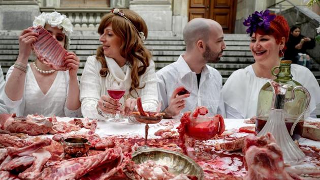 Activists of the 269 Animal freedom, a anti-speciesism association, parody the Christian Last Supper during a demonstration in Lausanne, Switzerland. (Fabrice Coffrini / AFP)
