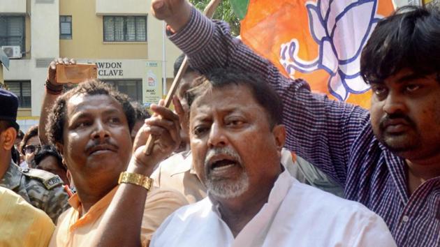 BJP leader Mukul Roy and others sits in a demonstration to protest against the violence during Panchayat polls' nomination filing, in Kolkata on Wednesday.(PTI) BJP leader Mukul Roy and others sits in a demonstration to protest against the violence during Panchayat polls' nomination filing, in Kolkata on Wednesday.(PTI)