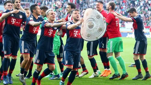 Bayern Munich beat Augsburg 4-1 to clinch the Bundesliga title.(REUTERS)