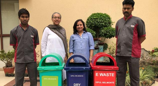 At Vipul Belmonte, a society with ten towers, a team of volunteer residents works closely with its house-keeping staff to segregate waste in the towers. (HT PHOTO) At Vipul Belmonte, a society with ten towers, a team of volunteer residents works closely with its house-keeping staff to segregate waste in the towers. (HT PHOTO)