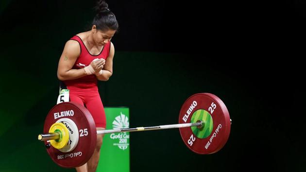 Sanjita Chanu celebrates a Commonwealth Games record in women’s 48kg weightlifting during the Commonwealth Games 2018 in Gold Coast, Australia on April 05, 2018. Chanu claimed India’s second gold medal at the Games, winning the top spot in the women’s 53kg category as well. (Manvender Vashist / PTI) Sanjita Chanu celebrates a Commonwealth Games record in women’s 48kg weightlifting during the Commonwealth Games 2018 in Gold Coast, Australia on April 05, 2018. Chanu claimed India’s second gold medal at the Games, winning the top spot in the women’s 53kg category as well. (Manvender Vashist / PTI)