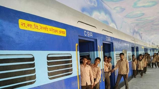 The classrooms have been painted like passenger compartments, the principal’s office looks like an engine and the veranda is the platform, where students hang out.(HT Photo)