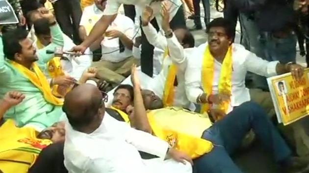 TDP MPs protest outside Prime Minister’s residence at Lok Kalyan Marg over demand of special category status for Andhra Pradesh on Sunday.(ANI Photo)