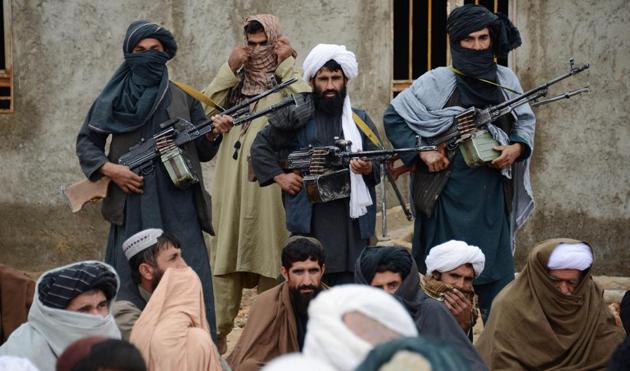 Afghan Taliban fighters listen to Mullah Mohammed Rasool, the newly-elected leader of a breakaway faction of the Taliban, in Farah province, Afghanistan.(AP/File Photo)