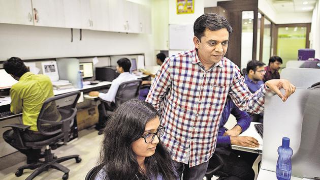 Vivek Singh Bagri, founder of Lead Tech, with his team at his Gurgaon office.(Anushree Fadnavis/HT Photo)