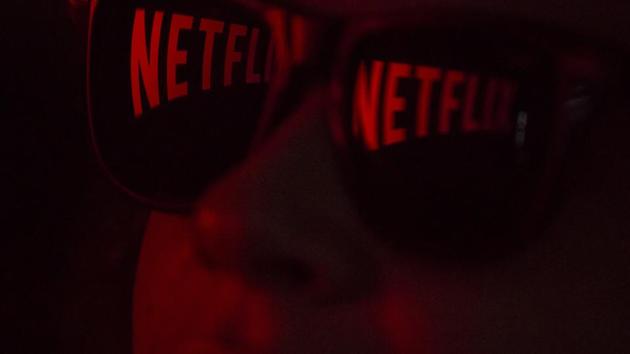 Netflix Inc. signage is reflected on a pair of sunglasses in an arranged photograph taken in Sao Paulo, Brazil.(Bloomberg) Netflix Inc. signage is reflected on a pair of sunglasses in an arranged photograph taken in Sao Paulo, Brazil.(Bloomberg)