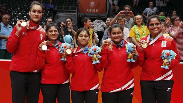 Gold medal winners of Team India’s table tennis team pose with medals. (REUTERS) Gold medal winners of Team India’s table tennis team pose with medals. (REUTERS)