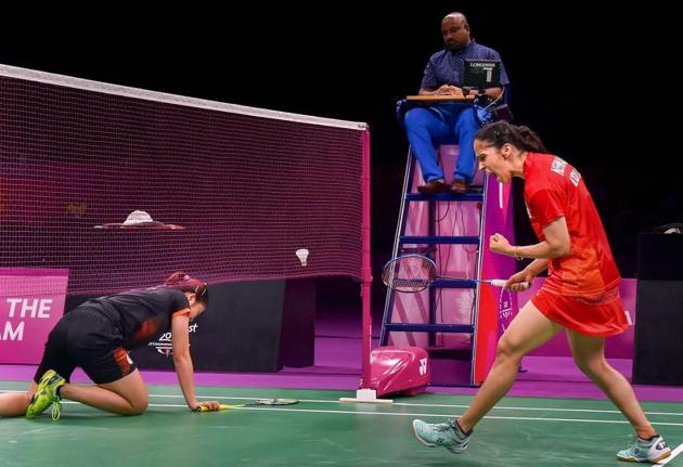 Saina Nehwal (R) won her singles match to help India win the badminton mixed team gold medal. (PTI) Saina Nehwal (R) won her singles match to help India win the badminton mixed team gold medal. (PTI)